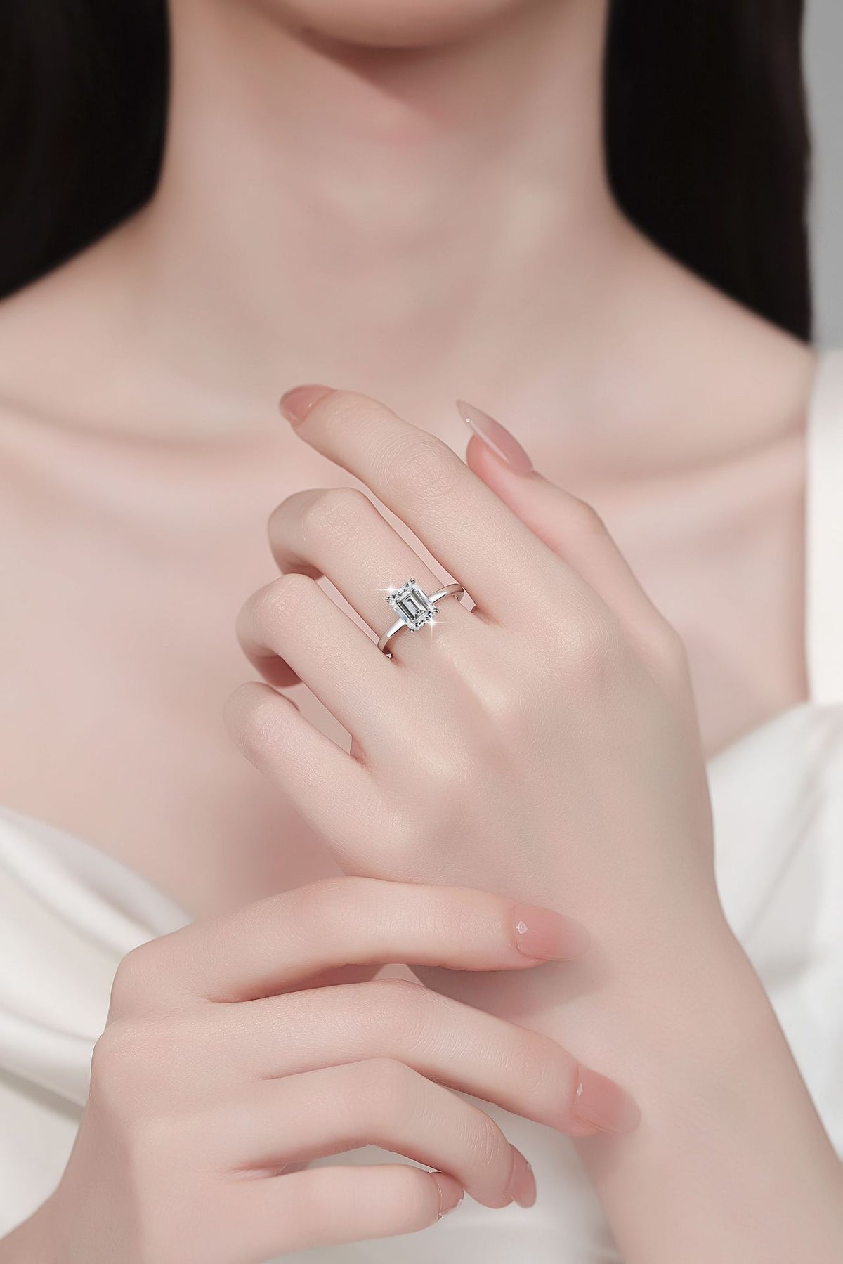Minimalist, chic, and stylish 925 silver ring for women, featuring an emerald-cut moissanite and 18K gold plating.