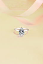 Hot-selling 925 sterling silver ring with 18K gold plating—a stylish, minimalist band featuring a pear-shaped (teardrop) moissanite.
