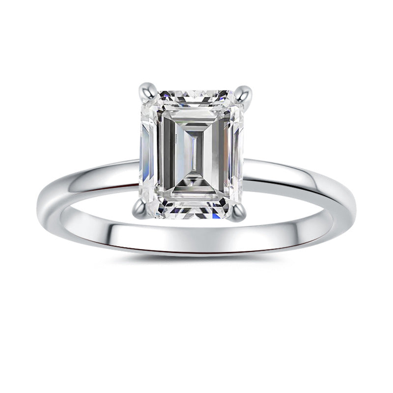 Minimalist, chic, and stylish 925 silver ring for women, featuring an emerald-cut moissanite and 18K gold plating.