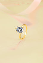 Hot-selling 925 sterling silver ring with 18K gold plating—a stylish, minimalist band featuring a pear-shaped (teardrop) moissanite.