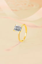 Minimalist, chic, and stylish 925 silver ring for women, featuring an emerald-cut moissanite and 18K gold plating.