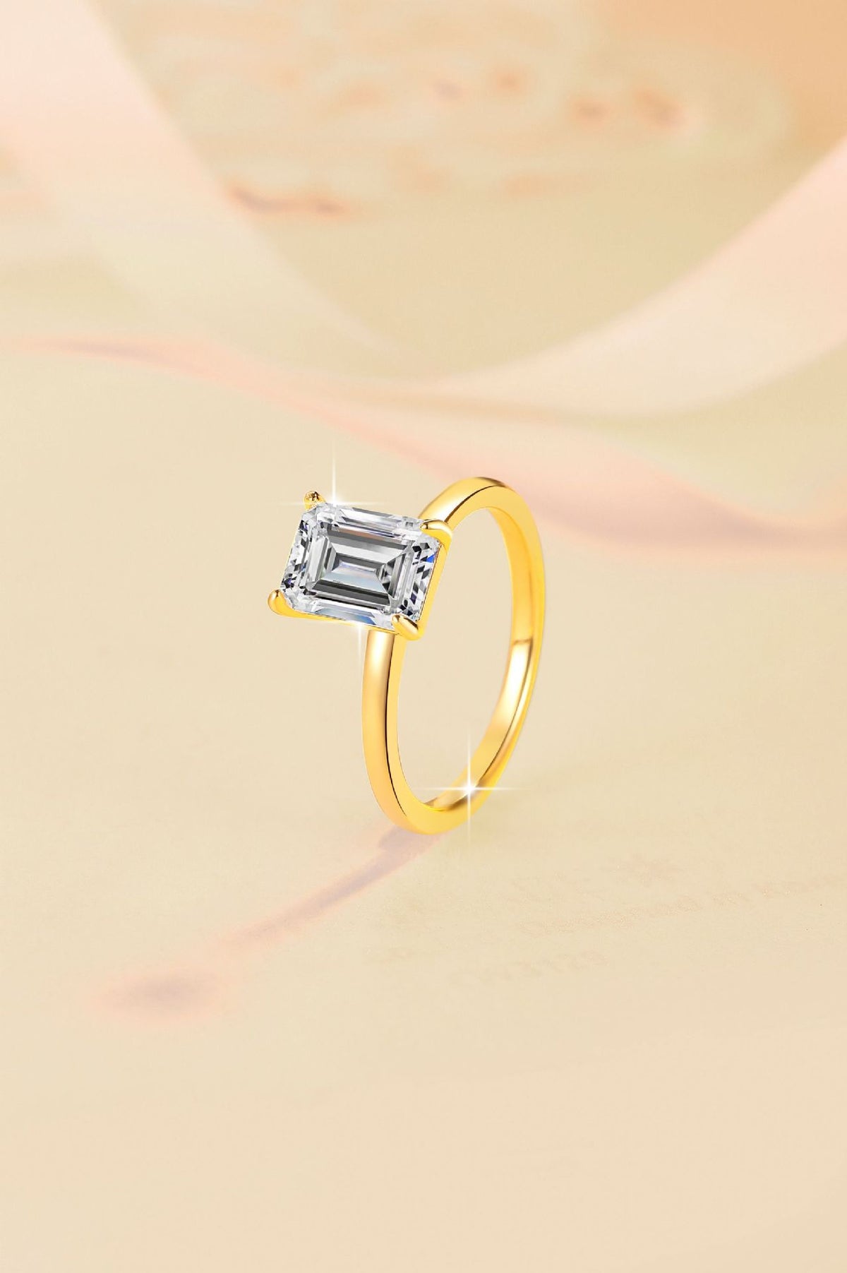 Minimalist, chic, and stylish 925 silver ring for women, featuring an emerald-cut moissanite and 18K gold plating.