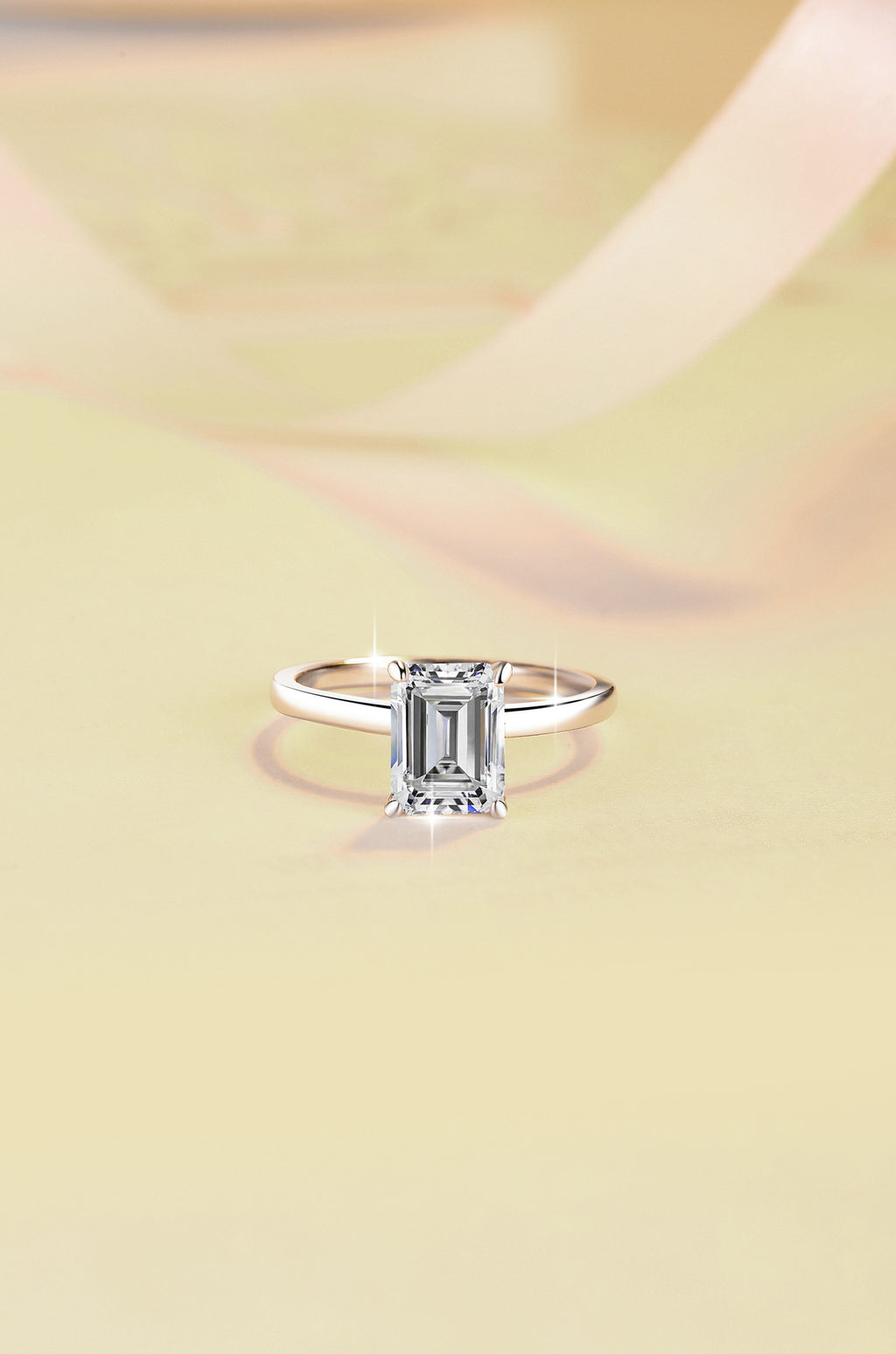 Minimalist, chic, and stylish 925 silver ring for women, featuring an emerald-cut moissanite and 18K gold plating.