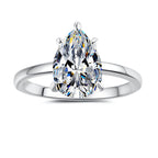 Hot-selling 925 sterling silver ring with 18K gold plating—a stylish, minimalist band featuring a pear-shaped (teardrop) moissanite.
