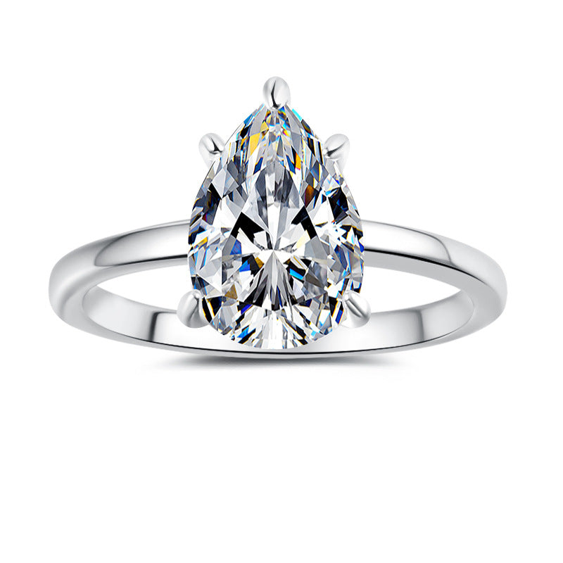 Hot-selling 925 sterling silver ring with 18K gold plating—a stylish, minimalist band featuring a pear-shaped (teardrop) moissanite.
